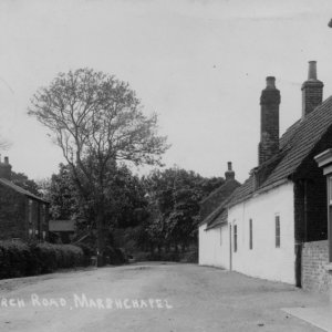 Church Lane, Marshchapel.
If you look closely, you can see some of the goods for sale in the old Post Office window.
From the date stamp on this postcard, this photograph could have been taken around 1910 / 12.
The postcard was sent to a Miss E. Blythe, c/o, Mrs Thompson, 3 Trinity Terrace, Bridlington - from Gertie.