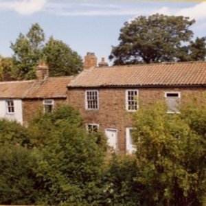 Front view of Dorset Gardens, Hallgarth, Marshchapel. Now demolished.
The original large house on the right was subsequently divided and the other houses were added onto it.
Local information has it that the original large house was a "Dame School". These schools were usually run by a widowed lady who charged a small amount
a day to educate the village children, when they could be spared from working on the land. We have as yet "at 2013", found no further information on this.