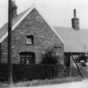 This was known as "Granny Nicks Cottage".
It was situated at the junction of Sea Dyke Way and North Lane.
Although it wasnt a shop, she would sell you lemonade and crisps at the door.