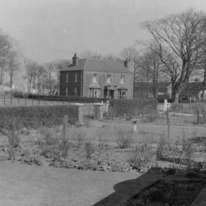 House at the gates of RAF North Coates, (now Cherry Park), where Roy and Doreen English lived with their children, Hazel and Terry.