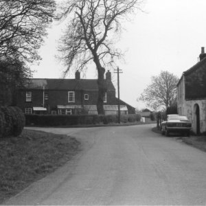 View down Church Lane with "Mersc" cottage on the right.
The row of cottages near the Church can be seen in the centre of the photograph.
This photograph taken c. 1975