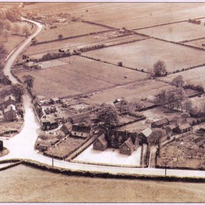 Sea Dyke Way - On the left of the school can clearly be seen "White Farm".
The date of the photograph is unknown, but the war memorial and school house "bottom left of the picture",
are in evidence, both of which were built in the 1920s.