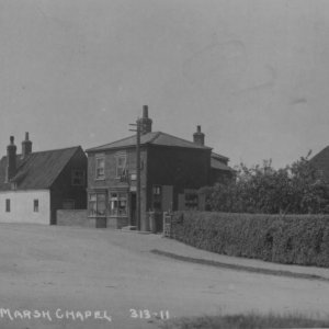 View down Church Lane, with the old "Post Office" in the centre of the picture, and "Ivanhoe" is on the right.
The cottages after the Post Office were demolished and now is the entrance to Harpham road.