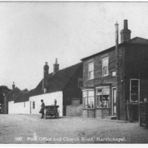 Another view of the Old Post Office in Church Lane, Marshchapel.
Unfortunately there is no name over the shop but from the age of the car this photograph could have been taken very early on in the 20th century.