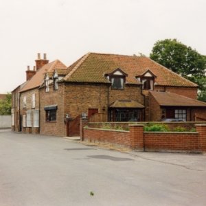 Hallgarth (Hallgarth runs from the Village Stores to Duckthorpe Lane).
The garden wall is the approximate location of the old thatched cottage which still existed in the early 1930s.
Also in this location was a Methodist Preaching House which as built in 1795. The original plaque for this can be seen in the Chapel.