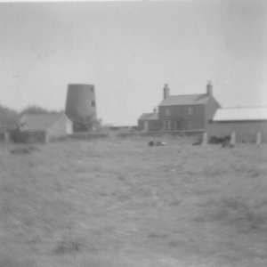 View from the School House in Mill Lane looking towards the Mill.
This photograph would have been taken before 1952 when Percy Lyons, the Headmaster, retired.