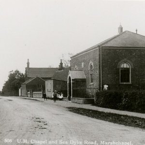 United Methodist Chapel which stood near the War Memorial on Sea Dyke Way.
The Old Bakery is further on in the photograph.
From the clothes this could have been taken in the early 1900s.
The Chapel was demolished in 1966.