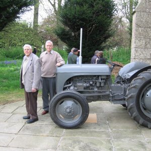 Stan Lowis and his son Royce with one of the exhibitis at a Church exhibition.