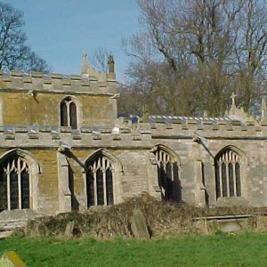 This photograph clearly shows the newer stone on the re-built Chancel.