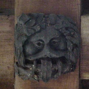 Ceiling boss - perhaps sticking your tongue out meant something different then!