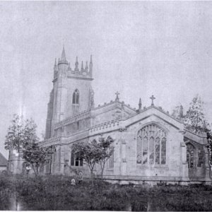 The Church in the mid 1800s. The Chancel had just been rebuilt, note the cleaner stonework. Also on the left of the picture is John Blyths Cottage which stood on the churchyard wall.
Is that Rev. Floyer and his children in the picture?