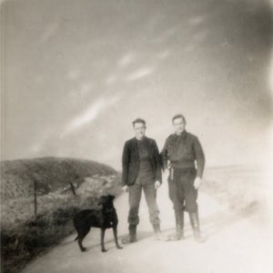 Len Leak with a man called Harold who was Polish, together with Sue the dog.
This picture could have been taken on Hurtons Farm, where Len worked after leaving school.