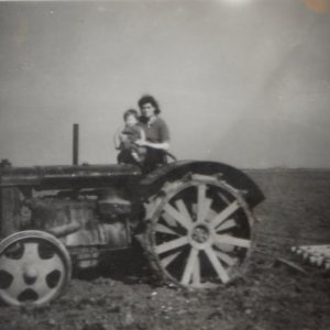 Beat Dowlman with young Chris Leak - Circa; 1944 / 45.
This photograph could have been taken on Hurtons Farm, where Chriss father Len went to work when he left school.