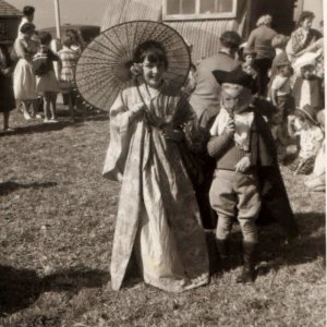 Angela and Heather Mossop at a Garden Fete held in the grounds of the old Village Hall.
C. Mid 1950s