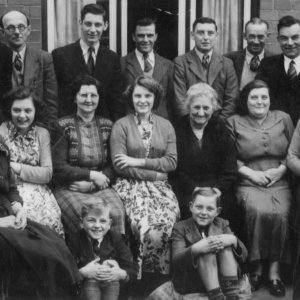 Photograph taken in 1954 at house adjacent to Marshchapel School.
Back row: Gordon Doulton, Benson and Sidney Chafor, Derek Clayton Reg Pennell, Norman Clayton, M D Hewson, Frank Parratt, John William Hockney Clayton
Middle Row: Eva Parratt nee Hockney Clayton, Edit Chafor nee Hockney Clayton, Pat Clayton, Hilda Doulton, Margaret Clayton, Mary Jane Hockney Clayton, Elsie Hockney Clayton, Mrs Hewson
Front row: Rodney Parratt, Graham Clayton