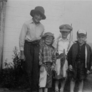 Wilf Deamer, Martin Smith and his brother Kevin, Eric Dowlman
Photograph probably taken in North Way, Marshchapel
C. Late 1950s