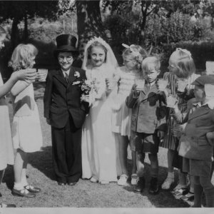 A "practice" wedding!
The Bridegroom is Irene Maddison and the Bride is Julie Lyons with other school friends looking on.