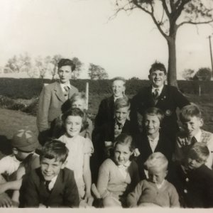 Thought to be a birthday party for Ian Burgess at his parents house on Sea Dyke Way - Circa; mid. to late 1950s.
Back Row - L to R; Tony Burgess, David Wray, Pat Jacklin.
Middle Row - L to R; Stephen Wray, Keith Wray, Sandra Wray, Tim Hanson.
Front Row - L to R; Ian Burgess "wearing cap", Martin Bridgestock, Marlene ? "Ians relative", Rosemary Williams, Martin Wray, Nigel Wray.