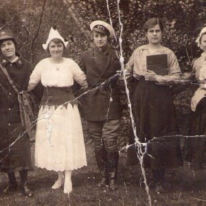 Ivy Atkin nee Riggall, is the girl on the left wearing the overall.
Third from the left is Hilda Sargent and last on the right is Mrs Hurton who was a teacher at the school.