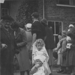Linda Lovatt dressed as a nurse and here sister, Janice, as the "patient". This photograph was taken c. 1954 in the house opposite the Village Stores in Littlefield Lane.