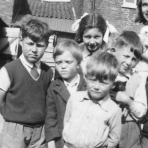 Left to right: Clive Darke, unknown, Marjorie Marshall, Richard Marshall, Margaret Chapman, Peter Marshall and Chris Leak at the front
The picture also includes 4 kittens - names unknown!