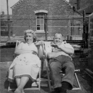 Phyllis and Jim Miller in their garden in Littlefield Lane.
The Wesleyan Chapel can be seen in the background.