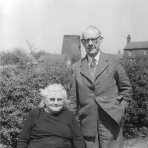 Mr Percy Smith Lyons and Mrs Norah Lyons
Both were teachers at Marshchapel School.
Mrs Lyons was the daughter of Fred and Maud Wray - village bakers.
This picture was taken in the School House garden c. 1948 or 1950.
In the background is The Mill, at the time owned by Clifford Wray.