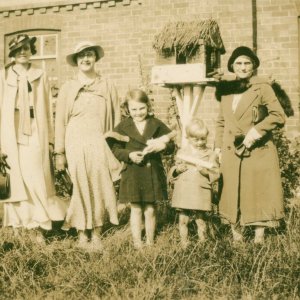 Photograph taken in the School House garden, possibly 1930s.
Left to right: Mary Lyons, Marion Lyons, Jean, Colin and Nora Lyons.