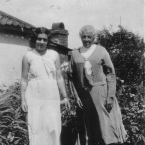 Phyllis Atkinson(Miller) with her mother Sarah Jane Atkinson c. 1930.
This photograph was taken outside the cottage that was down the green lane in Duckthorpe Lane on the right hand side past the farm workshops.  All that remans is a copse of trees.