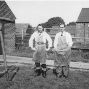 Roy Pickard and Frank Shephard.
They both worked at Marshchapel Butchers.
Frank Shephard was married to Lucy and eventually went to live in Fieldsend Terrace on Sea Dyke Way.  They had two children, June and Frank. June - now Houghton - is one of the Archivists. (2020)
The photograph was taken in the back garden of the butchers c. late 1950s or early 1960s