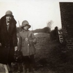 Kathleen Stubbs and Margaret Patrick - the dog was thought to have been called Jack.
This photograph was taken in West End Lane, Marshchapel. C. 1930s
