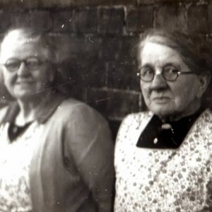 L - R: Clara Stubbs and one of her sisters Annie Dowlman.
Annie lived in one of the cottages near the Church.
The photograph was taken in the mid 1950s.