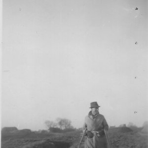 Sam Mossop walking down the tracks of the disused Potato Railway on S A Mossop Farms Ltd.