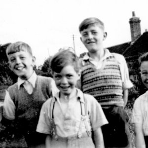 This photograph was taken at the rear of the old cottages which stood where the entrance to Harpham Road is now 
C. 1950
Left to right. Graham Atkinson, David Scrimshaw, Marsden Fenner, Stuart Grantham.