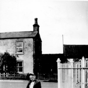 Stuart Granthams first car!
In the background can be seen their family home which stood in front of the Village Hall. The cottage has now been demolished.