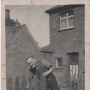 Alf Wright
This photograph was taken in the backyard of his Fish & Chip Shop on Sea Dyke Way.
The building next door was the Butchers shop.
