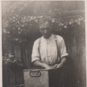 Alf Wight
This photograph shows Alf peeling potatoes by hand for the Fish & Chip Shop he ran.