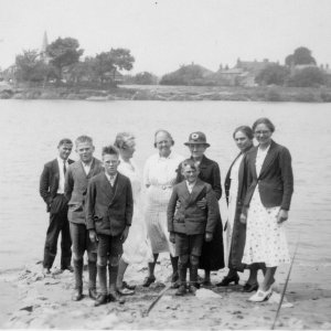 L to R: Aubrey Patrick, Cliff and Alec Dowlman, Fanny Epton/Pinder (married twice), Clara Stubbs, 
Annie Dowlman with Harold, Sarah Jane (known as Sally) and Grace Patrick.
Cliff, Alec and Harold Dowman were brothers, Sarah Jane Patrick was the mother of Aubrey ad Grace.
Fanny, Clara, Annie and Sarah Jane were sisters.