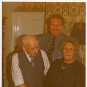 This is the Golden Wedding of Mr and Mrs Sargent of Littlefield Lane.
The man in the background is Vernan Walter Midgeley.  He became a well known opera singer but stayed with the Sargents whilst training at Agricultural College before a change of career.
