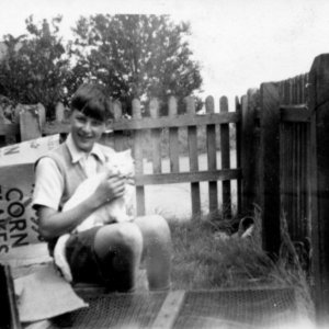 Richard Marshall, whose parents owned the shop on the corner of Sea Dyke Way and Littlefield Lane.
This photograph was taken in the garden of the shop - c. 1954