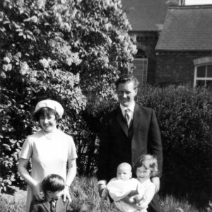 Midge and Julien Jackson with their three children
L to R: Ian 4yrs, Alice 6 months and Ruth 5 yrs.
This photograph was taken in the garden opposite the Wesleyan Chapel in Littlefield Lane on the Chapels Anniversary Sunday in 1966.