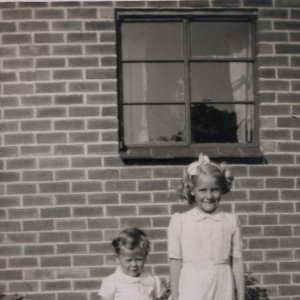 Chris Leak and Jennifer Leak.
This photograph would have been taken at Fieldsend Terrace where they were neighbours for a few years.
Chris and Jennifer were second cousins.
This photograph would have been taken in C.1946.