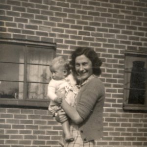 Royce Lowis with his mother Nancy.
Royces father worked as a blacksmith for Caudell Farms.
They lived opposite Fieldend Terrace in a house which was subsequetly demolished and a modern house built in its place.
This photograph taken c.1948.