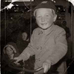 Pip Brooks
He lived at the White Horse, Marshchapel for many yers when his family ran the pub.
You will notice his finger is bandaged where his Grandmother caught it in the door.
As a treat she took him to Wonderland, Cleethorpes for the day where this photograph was taken.