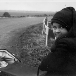 Rosemary Williams - now Broadhurst.
She is the daughter of William and Kathleen Williams.
This photograph was taken at Willow Tree Corner, Firebeacon before the building of Covenham Reservoir and subsequent houses - early or mid1950s.
With the amount of traffic using this road now (2013) this would have been a very dangerous outing for a child.
