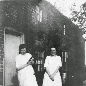 Amelia, known as Millie, Deamer on the left.
Photograph taken at Walnut Farm, now part of Mossop Farms.
Photograph probably taken in the 1920s.
Unfortunately the identity of the woman on the right is unknown.