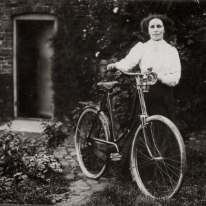 This photograph was taken outside Croft Cottages.
These cottages were accessed down a lane leading from Hallgarth and backed onto the houses in Littlefield Lane.
They have now been demolished.
Unfortunately the identity of the lady with the bicycle is unknown but from the clothes it is probable that the photograph was taken in the early 1900s.