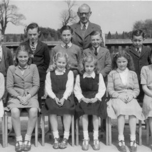 Marshchapel School 1950.
Headmaster Percy Lyons standing at back.
Back row: Robert Evison, Trevor Nicholson, John Campbell, John Brooks, Rex Johnson.
Front row: Marjorie Marshall, Val Riggall, Jennifer Leak, Nesta Leesing, Jasmine Hancok, Marie Lingard.