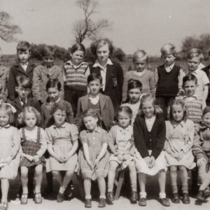 Marshchapel School early 1950s.
Back row: David Scrimshaw, Richard Marshall, Graham Hockney, David Evison, Trevor Clover, Raymond Wilson, Miss Daphne Campion, Wright - first name unknown - John Worrell, Unknown, Walter Brooks, Mick Grantham.
Middle row: Bill Wilson, George Worrell, Pat Jacklin, Pete Marshall, John Stones, Eddie Lingard, Ken Garner, Brian Brooks, Clive Darke.
Front: Stephen Alexander, Stephen Wray, Sandra Wray,Sandra Wilson, Diana Duncan, Lingard -first name unknown - Joyce Manders, Edna Worrell, Doreen Parker, Stuart Granthm, Mick Worrell, Chris Leak