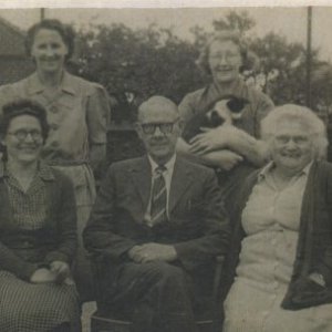This photograph was taken in the playground of Marshchapel School.
It must have been taken before Percy Lyons retired in 1952.
Back row: Peggy Atkinson, Asst. Cook, Marion Lyons (with cat) Cook.
Front row: Teachers Mrs Newton, Percy Lyons (Headmaster) and his wife Nora.